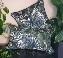 Load image into Gallery viewer, Hazeldee Home handmade cream and green botanical leaf print cotton cushion with contrast Hazeldee Home's trademark silky double tassels detailing.  Approximately 12" x 20" (30cm x 50cm) with a concealed zip.   Comes with a polycotton cushion inner.  Do not wash, Dry Clean Only.  Matching items available.