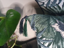 Load image into Gallery viewer, Hazeldee Home handmade cream and green botanical leaf print cotton cushion with contrast Hazeldee Home's trademark silky double tassels detailing.  Approximately 12" x 20" (30cm x 50cm) with a concealed zip.   Comes with a polycotton cushion inner.  Do not wash, Dry Clean Only.  Matching items available.