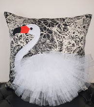 Load image into Gallery viewer, Hazeldee Home Handmade swan bird illustration character cushion with 3D feather effect trim.   A great conversational swan cushion for kids and grown ups alike!  Bring some fun and colour into your space with this handmade cushion with a white swan cushion with plume of white feather-like trim with a twill fabric floral monochrome base!  A Hazeldee Home design.  Approximately 16" x 16" (40cm x 40cm) with a centre back zip. Comes with a polycotton cushion inner.