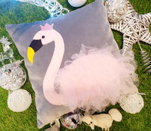 Load image into Gallery viewer, Hazeldee Home Handmade pink crown swan character cushion with 3D feather effect trim on a sumptuous Italian grey velvet base that adds a sophisticated edge.      A great conversational swan cushion for kids and grown ups alike!  Bring some fun and colour into your space with this handmade cushion with a white swan cushion with plume of white feather-like trim with a grey Italian velvet base!  A Hazeldee Home design.  Approximately 16" x 16" (40cm x 40cm) with a concealed zip.