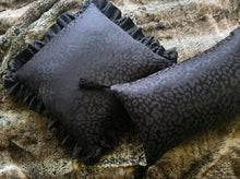 Load image into Gallery viewer, Hazeldee Home handmade black leopard jacquard design cushion with a fancy ruffle edge.  Perfect for living rooms and bedrooms alike.  A classy take on leopard that acts as a semi-plain print with silky and mat jacquard.  The ruffles add fun, romance and add that extra touch of glamour!  Approximately 18" x 18" (45cm x 45cm) excluding the with a concealed zip.