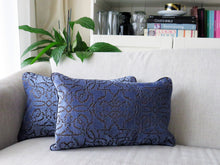 Load image into Gallery viewer, lilac velvet cushion with a textured pattern.  A Hazeldee Home Limited Edition Handmade textured lilac velvet cushion with silky grey embroidered filigree pattern and satin grey piping.    Approximately 12" x 20" (30cm x 50cm) with a concealed zip.   Comes with a polycotton lined cushion inner.  Very Peri cushion very peri homeware