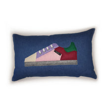 Load image into Gallery viewer, Handmade trainer cushion, rectangular bolster shape with real laces trim on a blue denim base. Approximately 12" x 20" (30cm x 50cm) with a zip opening. Comes with a polycotton cushion inner.