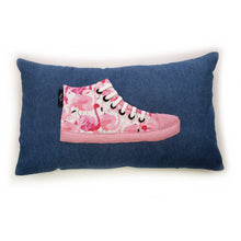Load image into Gallery viewer, Hazeldee Home Handmade hi-top trainer cushion, rectangular bolster shape with real laces trim on a blue denim base. A great conversational trainer cushion for kids and grown ups alike! Bring some fun and colour into your space with this handmade cushion with a hi-top trainer with laces detail! Bold flamingo print hi-top sneaker trainer cushion with contrast pink detail. Approximately 12" x 20" (30cm x 50cm) with a zip opening. Comes with a polycotton cushion inner.