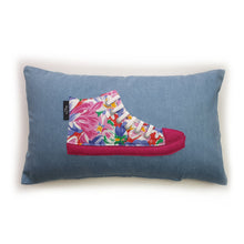Load image into Gallery viewer, Hazeldee Home Handmade hi-top trainer cushion, rectangular bolster shape with real laces trim on a blue denim base. A great conversational trainer cushion for kids and grown ups alike! Bring some fun and colour into your space with this handmade cushion with a hi-top trainer with laces detail! Bold floral print hi-top sneaker trainer cushion with contrast fuchsia pink detail. Approximately 12" x 20" (30cm x 50cm) with a zip opening. Comes with a polycotton cushion inner.