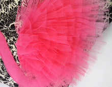 Load image into Gallery viewer, Handmade flamingo cushion with 3D feather effect trim.     A great conversational flamingo cushion for kids and grown ups alike!  Bring some fun and colour into your space with this handmade cushion with a pink flamingo cushion with plume of pink feather-like trim with a twill fabric floral monochrome base!  A one-of-a-kind Hazeldee Home design.  Approximately 16" x 16" (40cm x 40cm) with a centre back zip. Comes with a polycotton cushion inner.