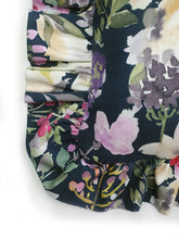 Load image into Gallery viewer, Handmade navy watercolour floral ruffle cushion. Aylesbury bold watercolour floral print with a Navy base adds a lovely touch of nature to any room. The scattered floral flowers and blooms are rich in colour and add the feeling of spring to any space. The ruffles add fun, romance and add that extra touch of glamour! Check out the matching navy and pink rectangle Tassel cushion! Approximately 16" x 16" (40cm x 40cm) excluding the ruffles with a back zip. Comes with a polycotton cushion inner.