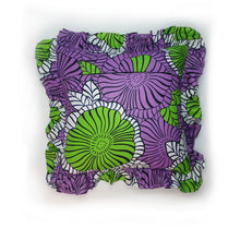 Load image into Gallery viewer, Get frills a plenty with this African wax print ruffle cushion featuring a bold purple and green graphic floral print by Hazeldee Home! These gorgeous feminine frill cushions add a touch of softness and romance. Considered as a feature cushion if you have a simplistic style in your home or as an accent cushion if you are a maximalist. They make a lovely addition to a sofa, chair or bedroom.