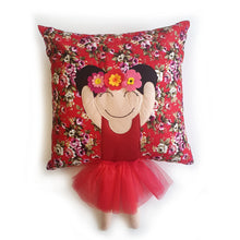 Load image into Gallery viewer, Handmade munchkin cushion inspired by artist Frida Kahlo with trim and legs that extend from the body of the cushion. Designed and handmade by Hazeldee Home, these cushions are a bundle of fun! Each Cushion is one-of-a-kind with bright backgrounds, different skin tones and hairstyles with flowers to match! Frida Kahlo was a Mexican painter known for self-portraits and use of bright colour. Approximately 16" x 16" (40cm x 40cm) with a centre back zip. Comes with a polycotton cushion inner.