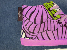 Load image into Gallery viewer, Handmade hi-top trainer cushion, rectangular bolster shape with real laces trim on a blue denim base. A great conversational trainer cushion for kids and grown ups alike! Bring some fun and colour into your space with this handmade cushion with a hi-top trainer with laces detail! Bold purple and green floral print hi-top sneaker trainer cushion with tonal detail