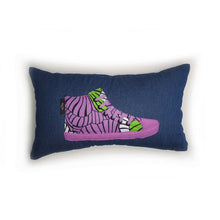 Load image into Gallery viewer, Handmade hi-top trainer cushion, rectangular bolster shape with real laces trim on a blue denim base. A great conversational trainer cushion for kids and grown ups alike! Bring some fun and colour into your space with this handmade cushion with a hi-top trainer with laces detail! Bold purple and green floral print hi-top sneaker trainer cushion with tonal detail