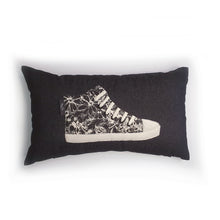 Load image into Gallery viewer, Handmade hi-top trainer cushion, rectangular bolster shape with real laces trim on a black denim base. A great conversational trainer cushion for kids and grown ups alike! Bring some fun and colour into your space with this handmade cushion with a hi-top trainer with laces detail! Black and cream monochrome floral print hi-top sneaker trainer cushion with cream laces and contrast detail.