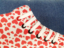 Load image into Gallery viewer, Hazeldee Home red and white heart print hi-top cushion is fun, flirty and a great way to introduce colour to a room. Its denim base gives a nice subtlety to the design.