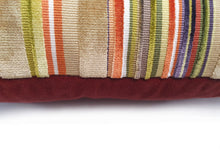 Load image into Gallery viewer, Hazeldee Home Handmade multi stripe lumbar rectangle cushion using a luxurious stripe velvet design for the front with oatmeal, rust, cream, cardamom and hints of lilac and purple. The reverse features an Italian velvet fabric in a rich sumptuous rust colour.  Together these colours beautifully depict colours of Marrakesh and add bold colour to any room.  Approximately 12" x 20" (30cm x 50cm) with a concealed zip.  Comes with a polycotton lined cushion inner.