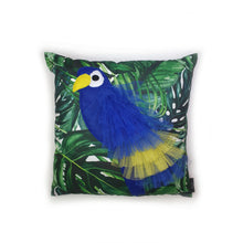 Load image into Gallery viewer, Hazeldee Home Handmade Parrot cushion with 3D feather effect trim.      A great conversational parrot cushion for kids and grown ups alike!  Bring some fun and colour into your space with this handmade cushion with a bold blue parrot cushion with plume of blue and yellow feather-like trim with a tropical leaf fabric base!  A one-of-a-kind Hazeldee Home design.  Approximately 16" x 16" (40cm x 40cm) with a centre back zip. Comes with a polycotton cushion inner.