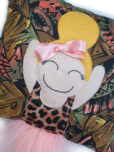 Load image into Gallery viewer, Hazeldee Home Handmade Munchkin cushion with trim skirt and legs that extend from the body of the cushion. Bold Aztec base with leopard body. Approximately 16" x 16" (40cm x 40cm) with a centre back zip. Comes with a polycotton cushion inner. Each Hazeldee Home Munchkin Character Cushion comes with a numbered Certificate of Authenticity.
