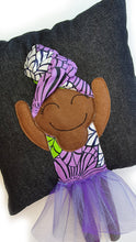 Load image into Gallery viewer, Hazeldee Home Handmade character kid's cushion with headwrap detail, trim and legs that extend from the body of the cushion.    Approximately 16" x 16" (40cm x 40cm) with a centre back zip. Comes with a polycotton cushion inner.  Each Hazeldee Home Munchkin Character Cushion comes with a numbered Certificate of Authenticity.  Black girl, black girl cushion, black girl pillow denim cushion, denim pillow