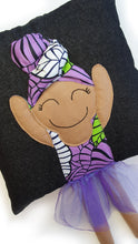 Load image into Gallery viewer, Hazeldee Home Handmade character kid's cushion with headwrap detail, trim and legs that extend from the body of the cushion.    Approximately 16" x 16" (40cm x 40cm) with a centre back zip. Comes with a polycotton cushion inner.  Each Hazeldee Home Munchkin Character Cushion comes with a numbered Certificate of Authenticity.  Black girl, black girl cushion, black girl pillow denim cushion, denim pillow