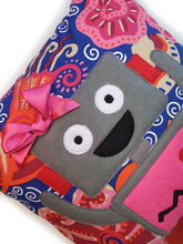 Load image into Gallery viewer, Hazeldee Home Handmade Robot Munchkin Cushion with trim detail and legs that extend from the body of the cushion.    Designed and handmade by Hazeldee Home, these cushions are a bundle of fun! Each Cushion is one-of-a-kind with bright backgrounds and bold contrasting robot character detail!   Approximately 16" x 16" (40cm x 40cm) with a centre back zip. Comes with a polycotton cushion inner.    Each Hazeldee Home Munchkin Character Cushion comes with a numbered Certificate of Authenticity.