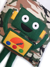 Load image into Gallery viewer, Hazeldee Home Handmade Robot Munchkin Cushion with trim detail and legs that extend from the body of the cushion.    Designed and handmade by Hazeldee Home, these cushions are a bundle of fun! Each Cushion is one-of-a-kind with bright backgrounds and bold contrasting robot character detail!   Approximately 16" x 16" (40cm x 40cm) with a centre back zip. Comes with a polycotton cushion inner.    Each Hazeldee Home Munchkin Character Cushion comes with a numbered Certificate of Authenticity.