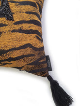 Load image into Gallery viewer, Handmade black and orange Tiger jacquard cushion with black rhinestone embellished letters spelling 'EXTRA' and finished with bold silky black tassels. A fun yet sophisticated take on animal homewares. Black rhinestone letters continues the bold but paired back theme. Perfect for the person who loves a little something 'EXTRA' or 'BOUJEE' and lives life as such!  Bold, sassy and fun, this cushion certainly makes a statement to any space! And of course those tassels add that 'EXTRA' touch of glamour!
