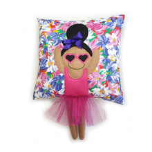 Load image into Gallery viewer, Handmade Munchkin cushion with heart sunglasses with trim and legs and tutu skirt that extend from the body of the cushion. Designed and handmade by Hazeldee Home, these cushions are a bundle of fun! Each Cushion is one-of-a-kind with bright backgrounds, different skin tones and hairstyles with bows to match! Approximately 16" x 16" (40cm x 40cm) with a centre back zip. Comes with a polycotton cushion inner. Each Hazeldee Home Munchkin Cushion comes with a numbered Certificate of Authenticity.