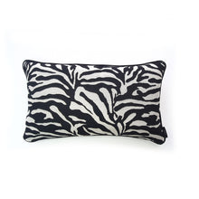 Load image into Gallery viewer, Hazeldee Home Limited Edition Handmade double-sided cushion with a bold monochrome cotton blend jacquard zebra design on one size and a vibrant fuchsia pink Italian cotton velvet on the reverse edged with a black cotton trim.     This cushion is fully reversible so you essentially get two looks in one!    Approximately 12" x 20" (30cm x 50cm) rectangle with a concealed zip.   Comes with a polycotton lined cushion inner.