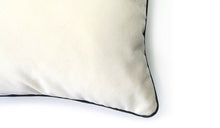 Load image into Gallery viewer, Hazeldee Home Limited Edition Handmade double-sided cushion with an intricate animal design inspired by the African Savannas featuring zebras, leopards, cheetahs, monkeys and more paired back with bold green plants and flowers on a neutral cream background.   The reverse features a tonal cream cotton velvet and forest green cotton piping trim.   This cushion is fully reversible so you get two looks in one!    Approximately 16" x 16" (40cm x 40cm) square with a concealed zip.