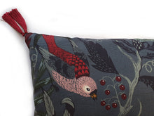 Load image into Gallery viewer, Hazeldee Home Handmade botanical green based wild flower floral print cotton cushion with Hazeldee Home's trademark contrast silky double tassels detailing.   Inspired by European botanical gardens, this floral print features playfully bold wild flowers with other wildlife in the form of whimsical butterflies berries and tree branches detailed within the print.  A truly enchanting design.