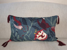 Load image into Gallery viewer, Hazeldee Home Handmade botanical green based wild flower floral print cotton cushion with Hazeldee Home's trademark contrast silky double tassels detailing.   Inspired by European botanical gardens, this floral print features playfully bold wild flowers with other wildlife in the form of whimsical butterflies berries and tree branches detailed within the print.  A truly enchanting design.
