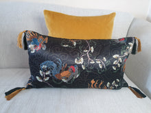 Load image into Gallery viewer, Hazeldee Home Handmade black based oriental print silky satin cushion with contrast silky double tassels. One of the original styles created by Hazeldee Home. A stunning addition to any sofa or bed. The smooth silky texture adds a boudoir like feel to any space. Approximately 12&quot; x 20&quot; (30cm x 50cm) with a concealed zip. Comes with a polycotton cushion inner.  Matching and coordinating items available in the Hazeldee Home Heritage Collection.
