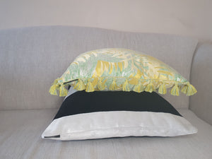 Hazeldee Home Handmade palm jacquard cushion with contrast tassel trim.  This striking yellow and green silky palm jacquard design is fresh and vibrant and a great colour vehicle paired with a fun tassel trim that adds movement and individuality.  Approximately 16" x 16" (40cm x 40cm) square with a concealed zip.  Do not wash, Dry Clean Only.  Matching items available