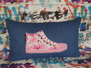 Hazeldee Home Handmade hi-top trainer cushion, rectangular bolster shape with real laces trim on a blue denim base.  A great conversational trainer cushion for kids and grown ups alike!  Bring some fun and colour into your space with this handmade cushion with a hi-top trainer with laces detail!  Bold flamingo print hi-top sneaker trainer cushion with contrast pink detail.  Approximately 12" x 20" (30cm x 50cm) with a zip opening.   Comes with a polycotton cushion inner.