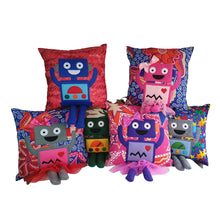 Load image into Gallery viewer, Hazeldee Home Handmade Robot Munchkin Cushion with trim detail and legs that extend from the body of the cushion. Designed and handmade by Hazeldee Home, these cushions are a bundle of fun! Each Cushion is one-of-a-kind with bright backgrounds and bold contrasting robot character detail! Approximately 16&quot; x 16&quot; (40cm x 40cm) with a centre back zip. Comes with a polycotton cushion inner. Each Hazeldee Home Munchkin Character Cushion comes with a numbered Certificate of Authenticity.
