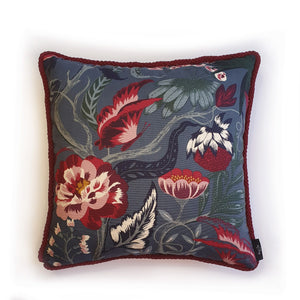 Hazeldee Home Handmade double-sided cushion with a fresh botanical green based wild flower floral print on one side and rich Italian velvet in burgundy on the reverse, edged with a contrasting burgundy intricate interwoven rope.   Inspired by European botanical gardens, this floral print features playfully bold wild flowers with other wildlife in the form of whimsical butterflies berries and tree branches detailed within the print.  A truly enchanting design.