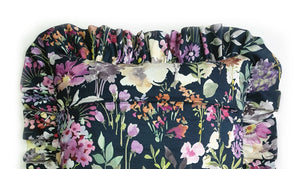 Handmade navy watercolour floral ruffle cushion.  Aylesbury bold watercolour floral print with a Navy base adds a lovely touch of nature to any room.  The scattered floral flowers and blooms are rich in colour and add the feeling of spring to any space.  The ruffles add fun, romance and add that extra touch of glamour!  Check out the matching navy and pink rectangle Tassel cushion! Approximately 16" x 16" (40cm x 40cm) excluding the ruffles with a back zip. Comes with a polycotton cushion inner.