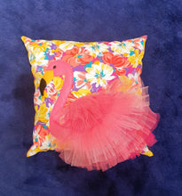 Load image into Gallery viewer, Hazeldee Home Handmade flamingo cushion with 3D feather effect trim.       A great conversational flamingo cushion for kids and grown ups alike!  Bring some fun and colour into your space with this handmade cushion with a pink flamingo cushion with plume of pink feather-like trim with a bright floral fabric base!  A one-of-a-kind Hazeldee Home design.   Approximately 16&quot; x 16&quot; (40cm x 40cm) with a centre back zip.  Comes with a polycotton cushion inner.
