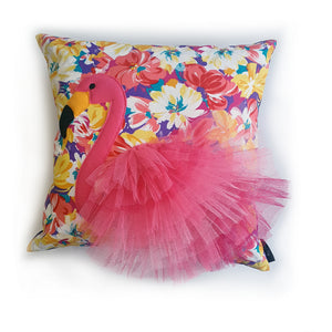 Hazeldee Home Handmade flamingo cushion with 3D feather effect trim.       A great conversational flamingo cushion for kids and grown ups alike!  Bring some fun and colour into your space with this handmade cushion with a pink flamingo cushion with plume of pink feather-like trim with a bright floral fabric base!  A one-of-a-kind Hazeldee Home design.   Approximately 16" x 16" (40cm x 40cm) with a centre back zip.  Comes with a polycotton cushion inner.