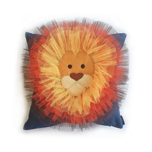 Hazeldee Home Handmade Lion Head illustration character cushion with 3D mane trim.      A great conversational Lion cushion!  Bring some fun and colour into your space with this handmade cushion with a neutral yet striking lion head cushion with 3D mane trim on a mid blue washed denim fabric base!  A one-of-a-kind Hazeldee Home design.  Approximately 16" x 16" (40cm x 40cm) with a zip at the base.