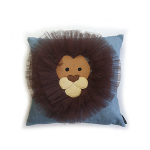 Hazeldee Home Handmade Lion Head cushion with 3D mane trim.      A great conversational Lion cushion!  Bring some fun and colour into your space with this handmade cushion with a natural lion head cushion with 3D mane trim on a blue washed denim fabric base!  A one-of-a-kind Hazeldee Home design.  Approximately 16" x 16" (40cm x 40cm) with a zip at the base.