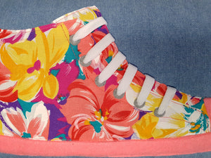 Hazeldee Home Bold floral print hi-top sneaker trainer cushion with white laces and contrast detail.