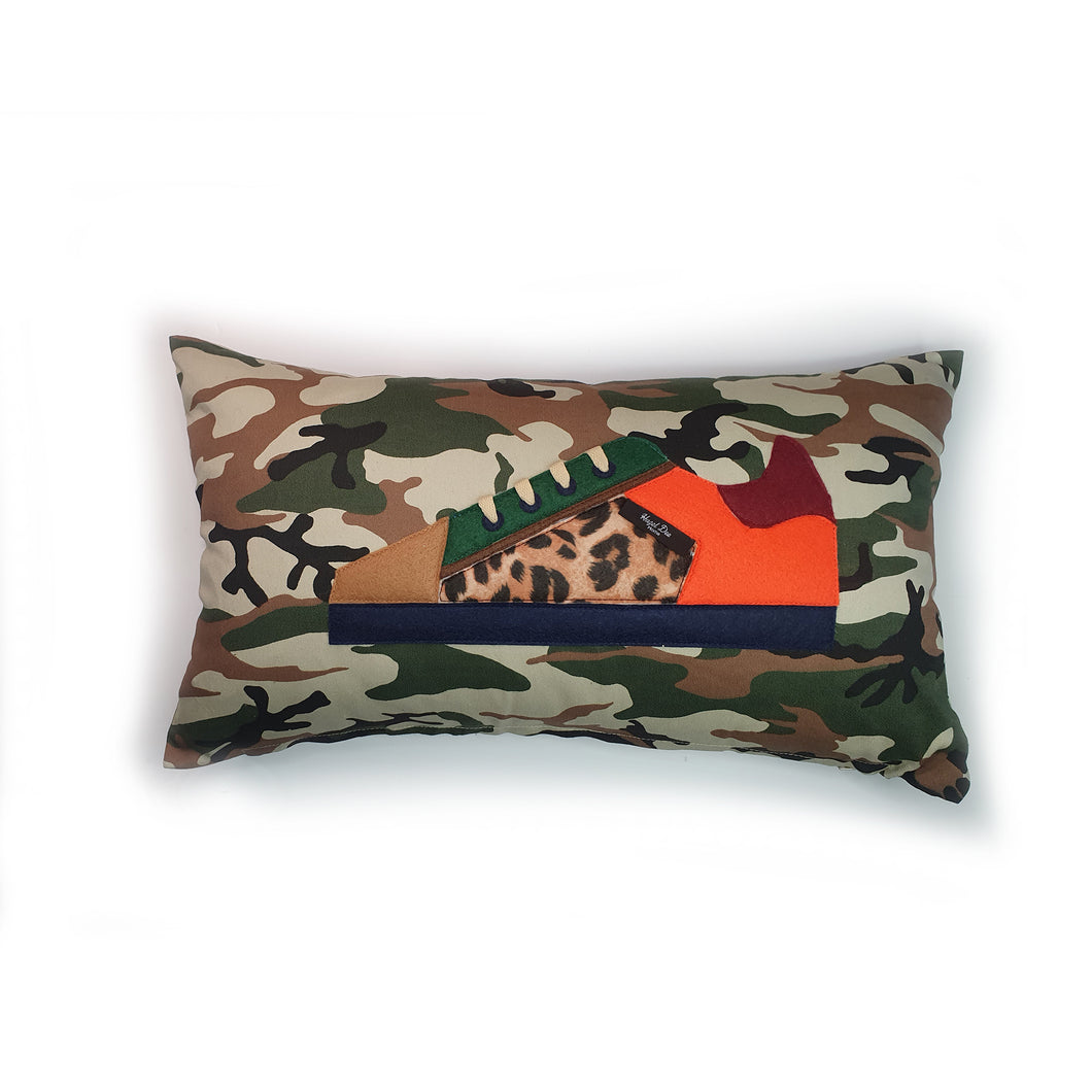 Handmade camouflage trainer cushion  A colour-block trainer cushion, rectangular bolster shape with real laces trim on a camouflage print base.     A great conversational camouflage trainer cushion for kids and grown ups alike!  Bring some fun and colour into your space with this handmade cushion with a trainer with laces detail!  colour-block sneaker trainer cushion with Hazeldee Home label detail.  Approximately 12