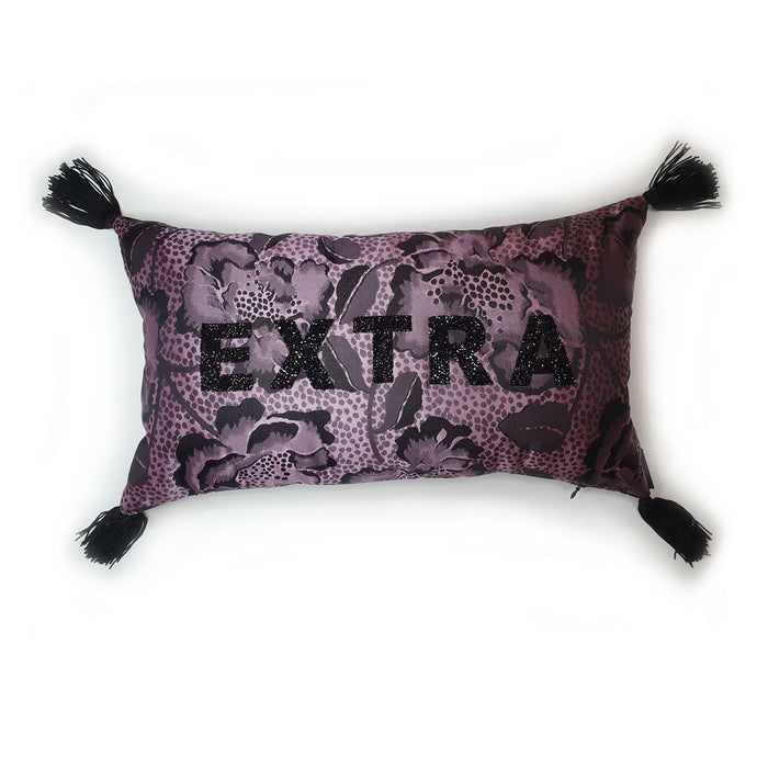 Hazeldee Home Handmade lilac and black floral and leopard jacquard cushion with black rhinestone embellished letters spelling 'EXTRA' and finished with bold silky black tassels.   The lilac fabric has a striking black floral and leopard design holds it own against the black rhinestone letters that sit on top.  A great combination.  Perfect for the person who loves a little something 'EXTRA' or 'BOUJEE' and lives life as such!