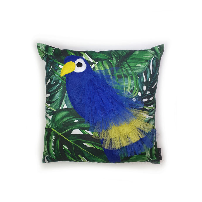 Hazeldee Home Handmade Parrot cushion with 3D feather effect trim.      A great conversational parrot cushion for kids and grown ups alike!  Bring some fun and colour into your space with this handmade cushion with a bold blue parrot cushion with plume of blue and yellow feather-like trim with a tropical leaf fabric base!  A one-of-a-kind Hazeldee Home design.  Approximately 16
