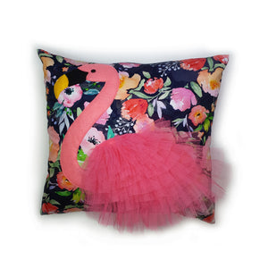Hazeldee Home handmade flamingo bird illustration character cushion with 3D feather effect trim.     A great conversational flamingo cushion for kids and grown ups alike!  Bring some fun and colour into your space with this handmade cushion with a pink flamingo cushion with plume of pink feather-like trim with a coral and navy floral base!  A one-of-a-kind Hazeldee Home design.  Approximately 16" x 16" (40cm x 40cm) with a centre back zip. Comes with a polycotton cushion inner.