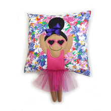 Load image into Gallery viewer, Handmade Munchkin cushion with heart sunglasses with trim and legs and tutu skirt that extend from the body of the cushion. Designed and handmade by Hazeldee Home, these cushions are a bundle of fun! Each Cushion is one-of-a-kind with bright backgrounds, different skin tones and hairstyles with bows to match! Approximately 16&quot; x 16&quot; (40cm x 40cm) with a centre back zip. Comes with a polycotton cushion inner. Each Hazeldee Home Munchkin Cushion comes with a numbered Certificate of Authenticity. 
