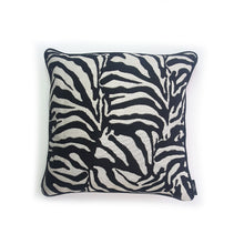 Load image into Gallery viewer, Hazeldee Home Limited Edition Handmade double-sided cushion with a bold monochrome cotton blend jacquard zebra design on one size and a vibrant fuchsia pink Italian cotton velvet on the reverse edged with a black cotton trim.     This cushion is fully reversible so you essentially get two looks in one!    Approximately 16&quot; x 16&quot; (40cm x 40cm) square with a concealed zip.   Comes with a polycotton lined cushion inner.  Do not wash, Dry Clean Only.
