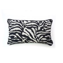Load image into Gallery viewer, Hazeldee Home Limited Edition Handmade double-sided cushion with a bold monochrome cotton blend jacquard zebra design on one size and a vibrant fuchsia pink Italian cotton velvet on the reverse edged with a black cotton trim.     This cushion is fully reversible so you essentially get two looks in one!    Approximately 12&quot; x 20&quot; (30cm x 50cm) rectangle with a concealed zip.   Comes with a polycotton lined cushion inner.
