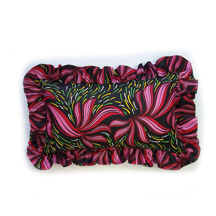 Get frills a plenty with this bold African print ruffle cushion by Hazeldee Home!  These gorgeous frill cushions add a bold splash of colour and vibrancy.  The pink, red, yellow and green swirls are beautifully contrasted against the black base.  A fabulous feature cushion that will make your space sing!