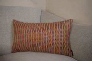 Hazeldee Home multicoloured stripe lumbar cushion using a beautifully heavy woven fabric with a herringbone detail on a neutral base.  A multicoloured stripe on the front - An off-white textured Italian cotton velvet on the reverse.  This cushion has a wonderfully homely feel to it.  The texture gives dimension and depth and is bold yet neutral due to its neutral undertone.  Approximately 12" x 20" (30cm x 50cm) with a concealed zip.  Comes with a polycotton lined cushion inner.